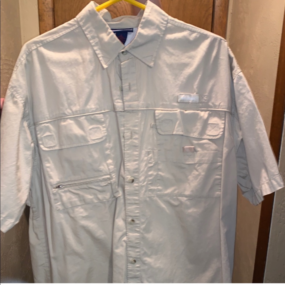 Short sleeve button down “Reel Legends” shirt.